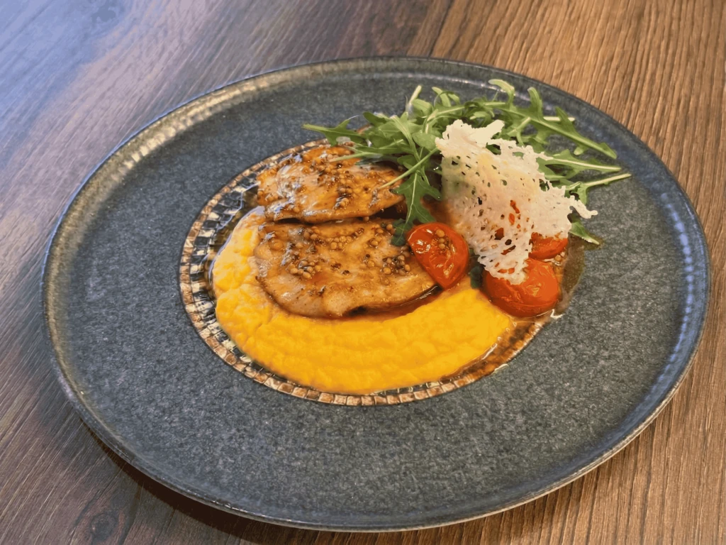 Chicken fillet on celery and carrot purée